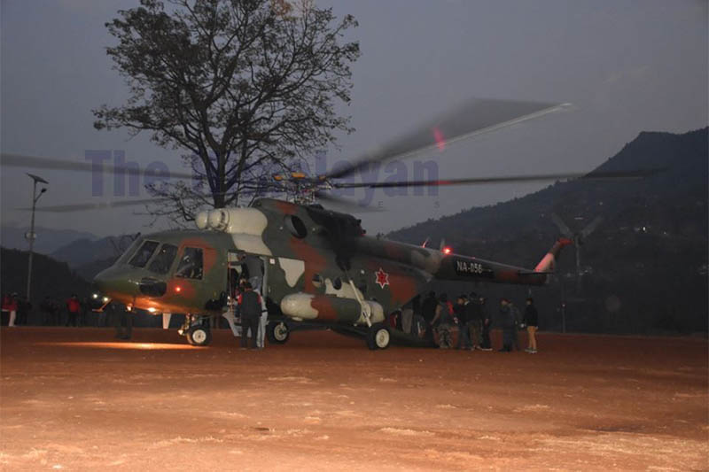Locals and officials wheel injured persons into Nepal Army helicopter before airlifting them to Kathmandu, in Dhadingbesi, on Tuesday, January 21, 2020. Photo: Keshav Adhikari/THT