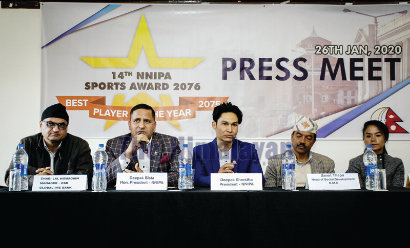 Olympian and NNIPA honorary president Deepak Bista (second from left) speaks during a press meet regarding the NNIPA Sports Award in Kathmandu on Sunday. Photo: THT