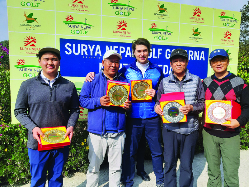 (From left) Phintso Ongdi Lama, Tendi Sherpa, Vijay Shrestha Einhaus, Babu Sherpa and Ang Phurba Sherpa hold their trophies after the Surya Nepal Gokarna Monthly Medal at the Gokarna Golf Club in Kathmandu on Saturday.