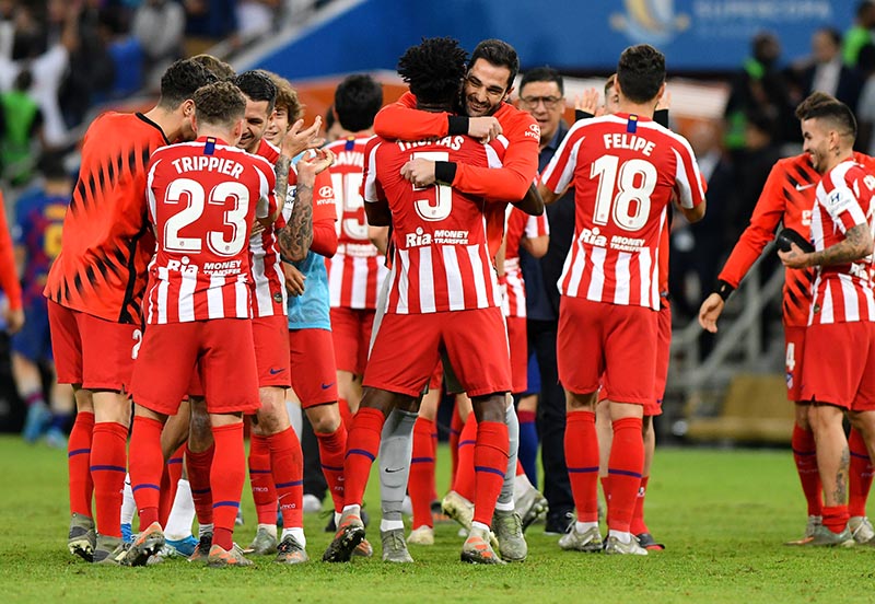 Atletico Madrid's Kieran Trippier celebrtes with teammates after the match during the Spanish Super Cup Semi Final match between FC Barcelona and Atletico Madrid, in King Abdullah Sports City, Jeddah, Saudi Arabia, on January 9, 2020. Photo: Reuters