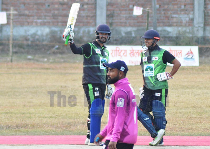 Province-3 skipper Subash Khakurel raises his bat after completing half century against Province-1 during their Manmohan Memorial National One-Day Cricket Tournament match at the Inaruwa grounds in Sunsari on Saturday. Photo: THT