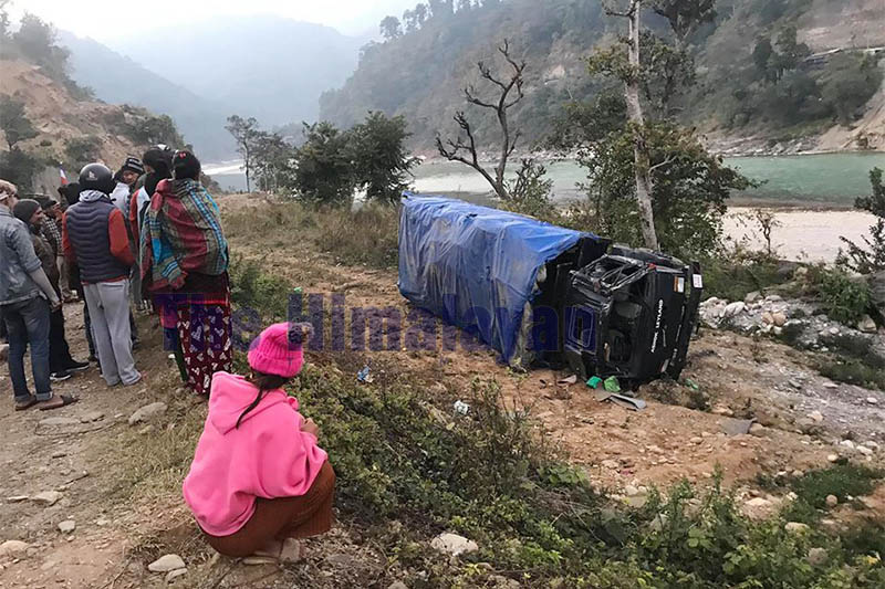 Locals gather around the accident site at Devghat Rural Municipality-5 in Tanahun district, on Wednesday, January 15, 2020. Photo: Madan Wagle/THT