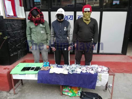 This image shows three persons along with banned pharmaceutical drugs arrested at Thado Line, Aanbukaireni Rural Municipality-3 in Tanahun district, in January, 2020. Photo: Madan Wagle/THT