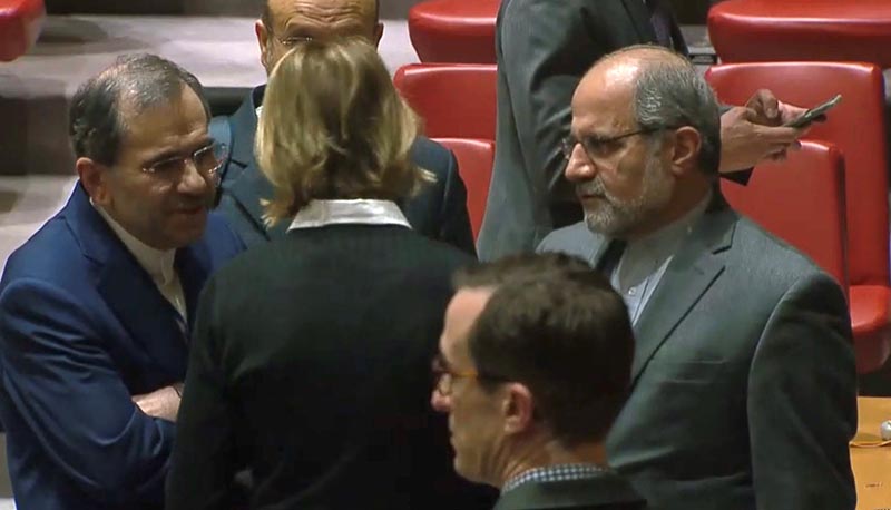 US Ambassador to the United Nations Kelly Craft speaks with Iran's UN Ambassador Majid Takht Ravanchi in the UN Security Council chamber in New York City, US in a still image from video taken on December 19, 2019.  UN TV via Reuters