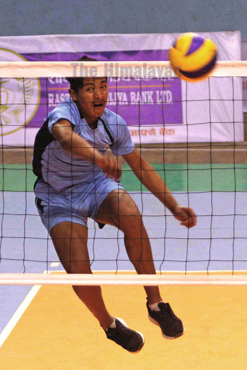 Bishnu Basnet of Nayabazar Social Youth Club attempts a spiker against RG Volleyball Group during their RBB-NVA National Women's /Men's Volleyball Club Championship at NSC covered hall, Tripureshwor in Kathmandu on Saturday. Photo: Udipt Singh Chhetry/THT