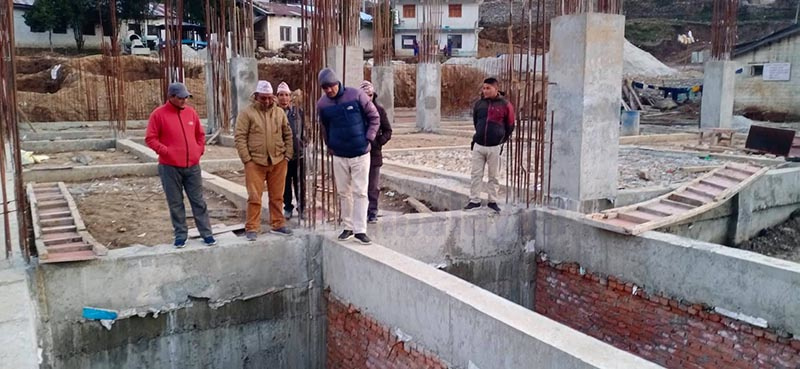 Lawmaker Lal Bahadur Thapa among others inspecting the construction site of 50-bed district hospital in Bajura, on Wednesday, February 12, 2020.  Photo: Prakash Singh/ THT