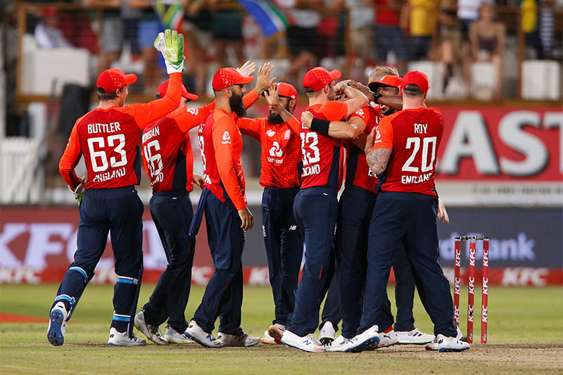 England players celebrate winning the match. Photo: Reuters