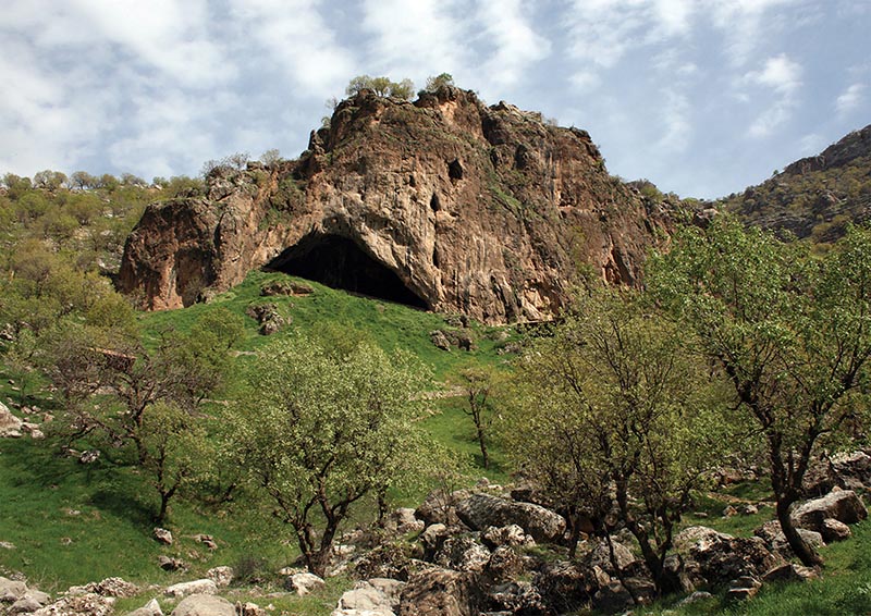 A view of the entrance to Shanidar Cave in the foothills of the Baradost Mountains in Iraqu2019s northern Kurdistan region, the site where fossils of 10 Neanderthals have been unearthed is seen in an undated photo. Photo courtesy of Graeme Barker/Handout via Reuters