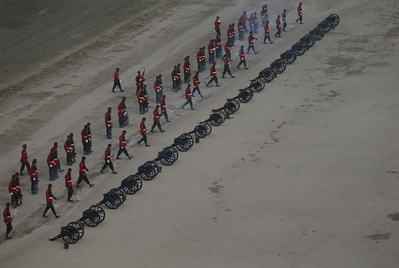 Nepal Army soldiers walk to fire cannon shots during the grand rehearsal of Army Day, in Kathmandu, on Tuesday, February 18, 2020. Photos: Skanda Gautam/THT