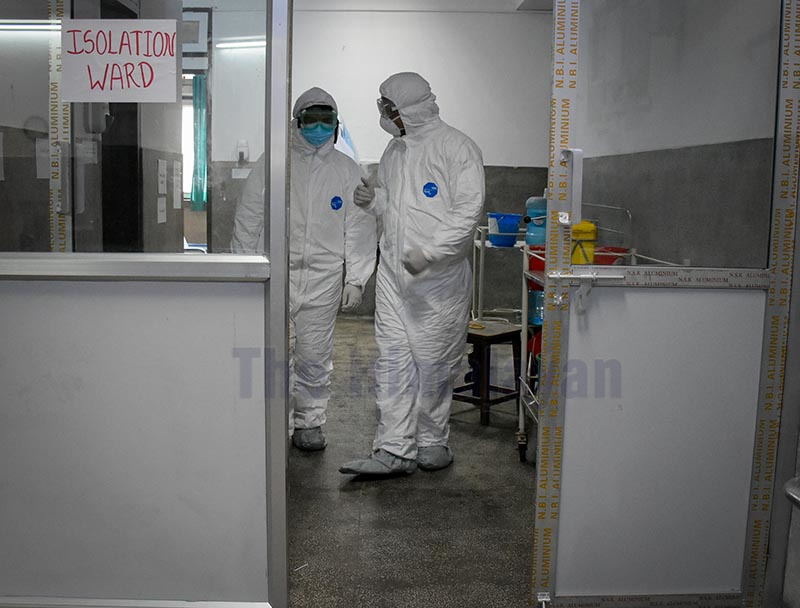 Doctors involved in treating suspected coronavirus patients wearing protective gear in the isolation ward of Sukraraj Tropical and Infectious Disease Hospital, Teku, on Monday.  Photo: Naresh Shrestha/ THT