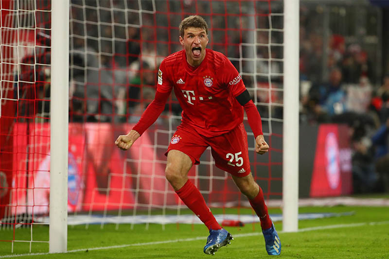 Bayern Munich's Thomas Muller celebrates scoring their second goal. Photo: Reuters