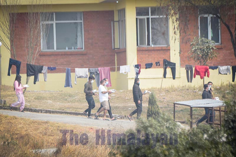 Quarantined persons seen walking on the premises of Nepal Electricity Authority Training Centre, in Bhaktapur, on Monday, February 17, 2020. Photo: Naresh Shrestha/THT