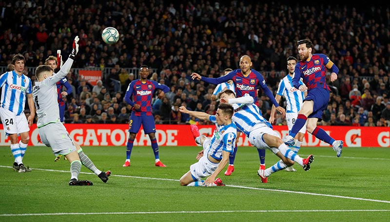 Barcelona's Lionel Messi shoots at goal during the La Liga Santander match between FC Barcelona and Real Sociedad, at Camp Nou, in Barcelona, Spain, on March 7, 2020. Photo: Reuters