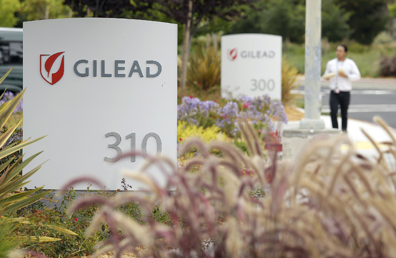 A man walks outside the headquarters of Gilead Sciences in Foster City, California July 9, 2015. Photo: AP/File