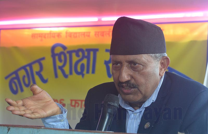 Minister of Education, Science and Technology Giriraj Mani Pokhrel speaking at the u2018municipal education for empowerment of community schoolu2019 inauguration programme, in Golbazaar, Siraha, on Saturday. Photo: THT