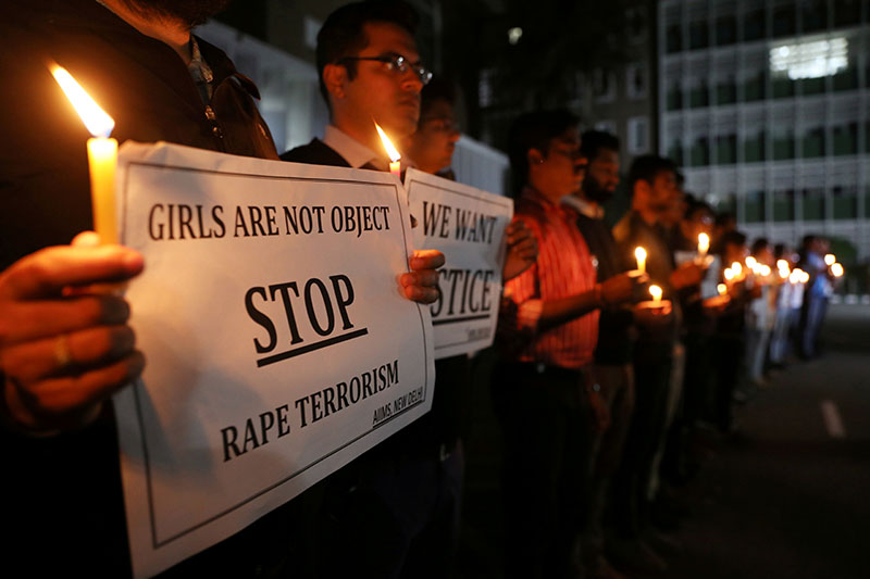 FILE - Resident doctors and medical students from All India Institute Of Medical Sciences (AIIMS) attend a candle-lit march to protest against the alleged rape and murder of a 27-year-old woman on the outskirts of Hyderabad, in New Delhi, India, December 3, 2019. Photo: Reuters