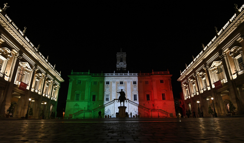 Rome's Town Hall is lit up with the colours of the Italian flag to show solidarity with the country as it continues to battle coronavirus, in Rome, Italy, March 17, 2020. Photo: Reuters