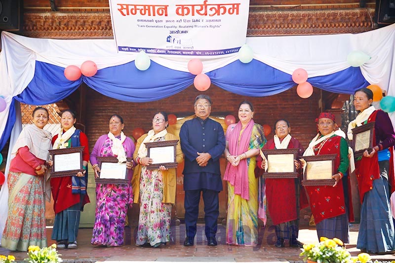 Women, who run homestays in different districts across the country, posing for photographs after being felicitated on the occasion of Women’s Day at Maiti Nepal Office in Kathmandu, on Sunday, March 8, 2020. Photo: Sjanda Gautam/THT