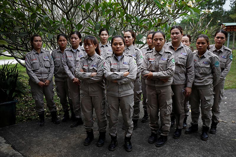 Members of all-female landmines clearance team listen to their captain before their morning work at a bombs and landmines exhibition in Quang Tri province, Vietnam March 4, 2020. Photo: Reuters