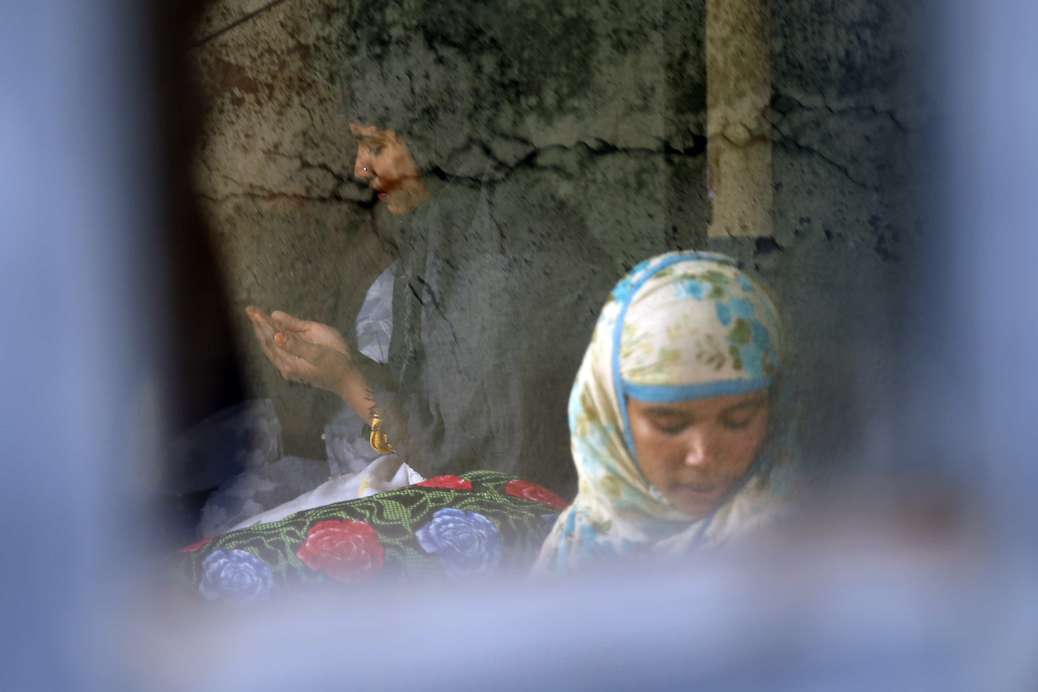 People from the Muslim community pray during the holy month of Ramadan at their home, on the 33rd day of government-imposed lockdown, amid concerns over the spread of COVID-19, in Kathmandu, on Saturday, April 25, 2020. Photo: Skanda Gautam/THT