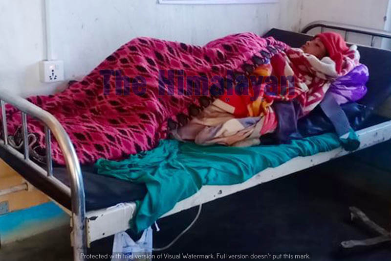 A woman with spinal injury rests on a hospital bed in Bajura, on Friday, April 24, 2020. Photo: Prakash Singh/THT