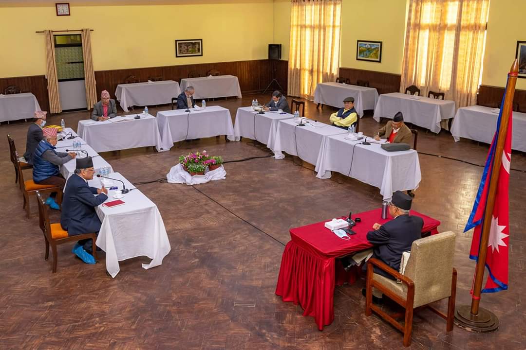 FILE - Nepal Communist Party (NCP) leaders hold the party's secretariat meeting at Prime Minister KP Sharma Oli's official residence in Baluwatar, Kathmandu, on Wednesday, April, 29, 2020. Photo courtesy: PM's Secretariat