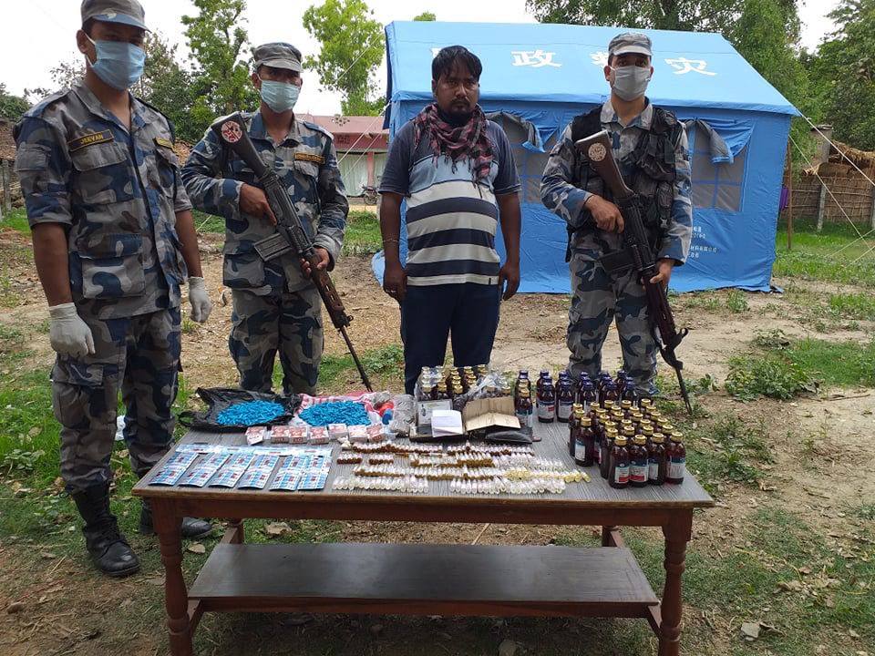 Armed Police force confiscate prohibited drugs from a man in West Nawalparasi, on Monday, April 27, 2020. Photo: Shreeram Sigdel/THT