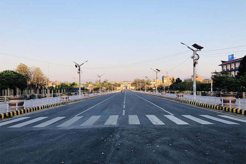 A motorbike passes on a deserted road on the 27th day of the government-imposed lockdown amid concerns on the spread of COVID-19, in Kathmandu, on Sunday, April 19, 2020. Photo: Mausam Shah Nepali/THT