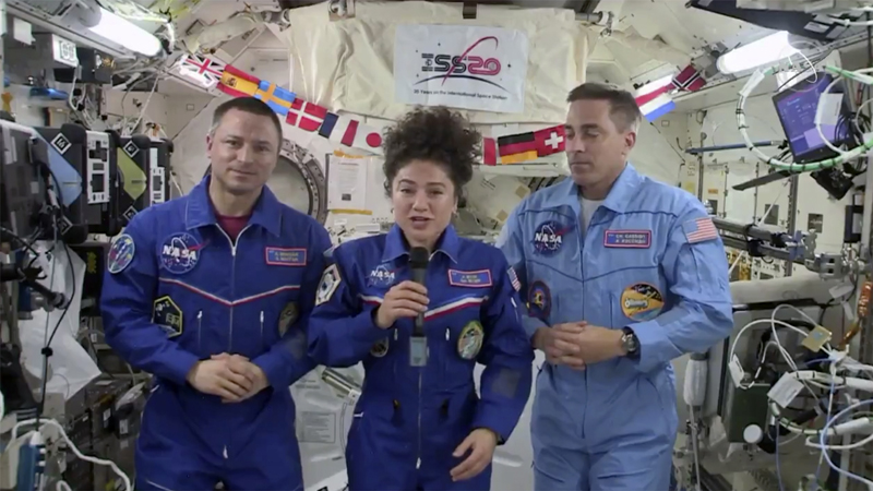 In this image from video made available by NASA, US astronaut Jessica Meir speaks, accompanied by Andrew Morgan and Chris Cassidy, during a news conference held by the American members of the International Space Station on Friday, April 10, 2020. Photo: NASA via AP