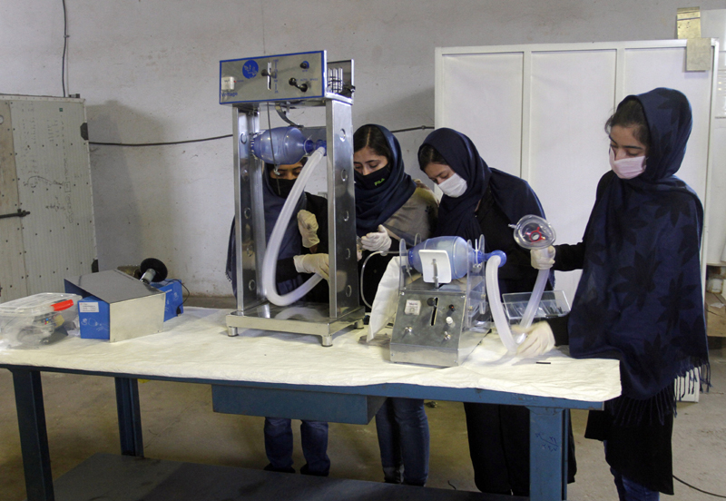 A group of young girls are developing two types of cheap ventilator devices using Toyota car spare parts to help the fight against the coronavirus pandemic in Herat, west of Kabul, Afghanistan,  Wednesday, April 8, 2020. Photo: AP