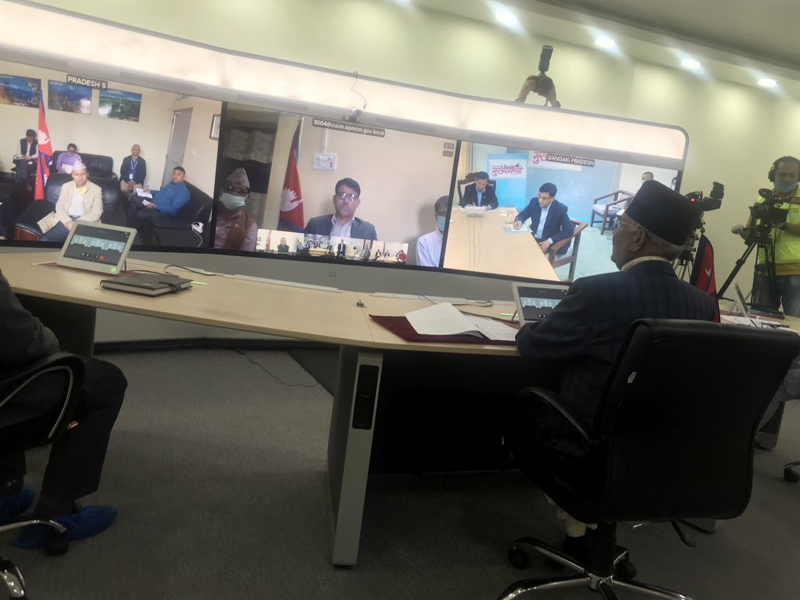 Prime Minister KP Sharma Oli in a video conference with chief ministers of all seven provinces, being held in Kathmandu, on Saturday, April 11, 2020. Photo Courtesy: Foreign Minister Pradeep Gyawali/Twitter