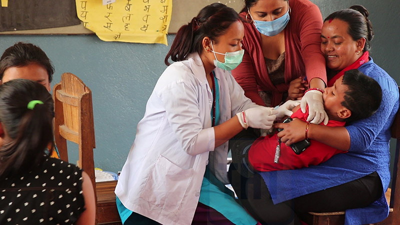 A child receiving measles-rubella vaccine in Dhading district, on Thursday, April 30, 2020. Photo: Keshav Adhikari/THT