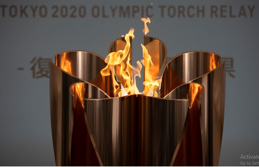 In this March 24, 2020, file photo, the Olympic Flame burns during a ceremony in Fukushima City, Japan. The Olympic flame is going to be on display until the end of April in Japan's northeastern prefecture of Fukushima. Tokyo Olympic and prefecture officials held an official u201chandover ceremonyu201don Wednesday, April 1, at the J-Village National Training Center in Fukushima. File Photo: AP