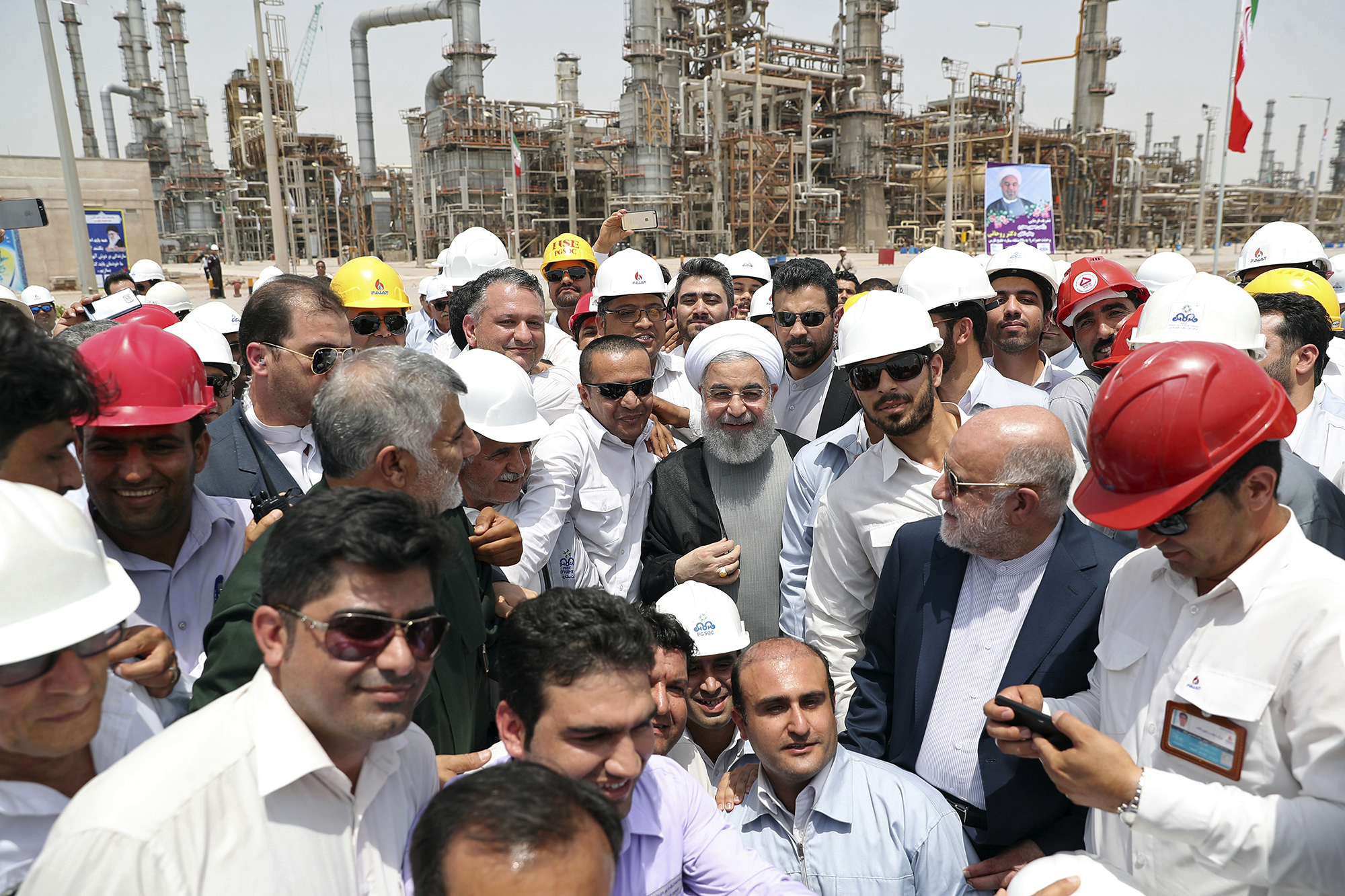 eleased by an official website of the office of the Iranian Presidency, Iranian President Hassan Rouhani, center, inaugurates the Persian Gulf Star Refinery in Bandar Abbas, Iran. Five Iranian tankers likely carrying at least $45.5 million worth of gasoline and similar products are now sailing to Venezuela as of Sunday, May 17, 2020, part of a wider deal between the two U.S.-sanctioned nations amid heightened tensions between Tehran and Washington. Analysts say the gasoline they carry came from the Persian Gulf Star Refinery. (Iranian Presidency Office via AP, File)
