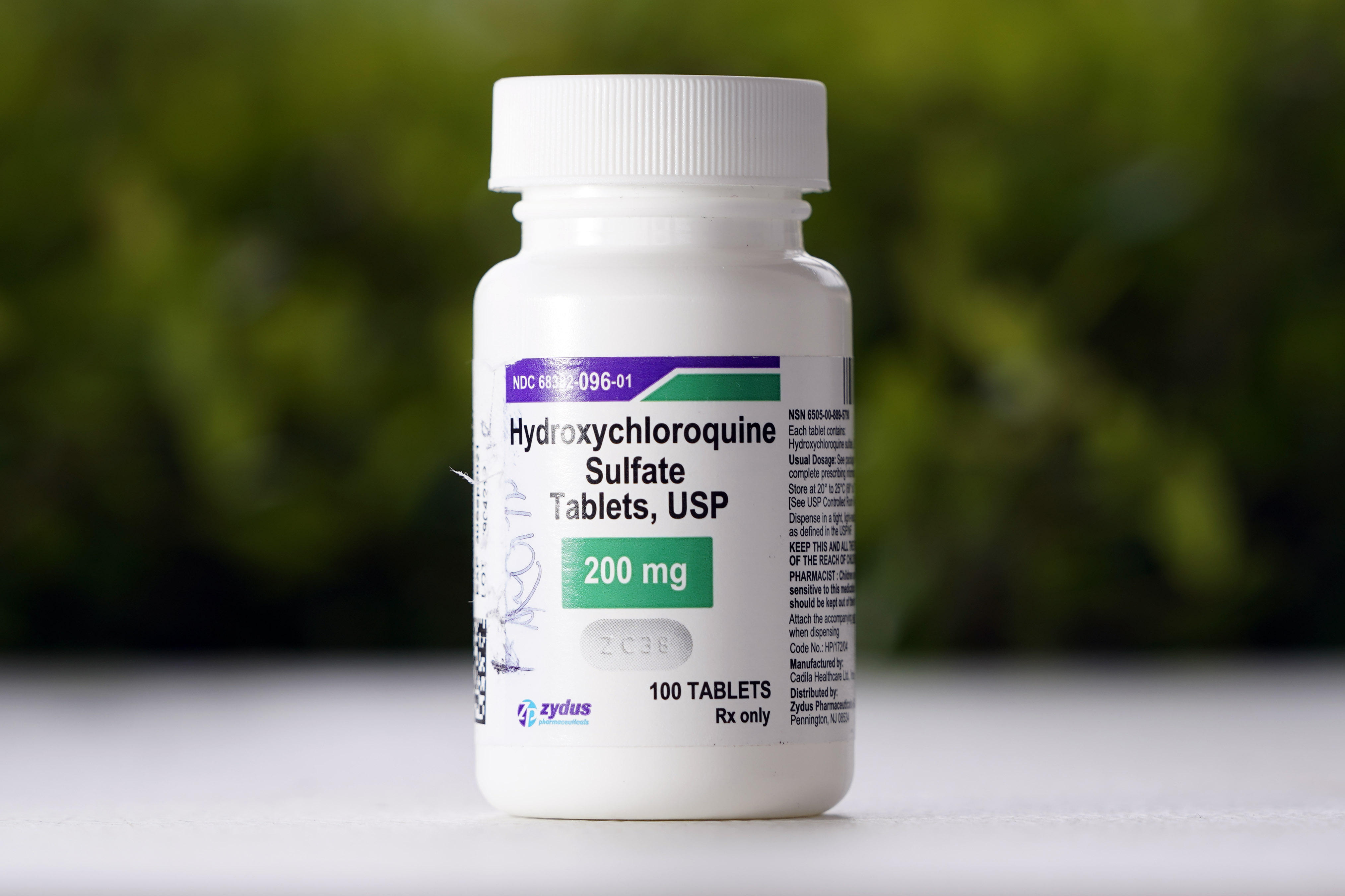 A bottle of hydroxychloroquine tablets in Texas City, Texas. The World Health Organization said Monday May 25, 2020, that it will temporarily drop hydroxychloroquine from its global study into experimental COVID-19 treatments because its experts need to review all available evidence. Photo: AP