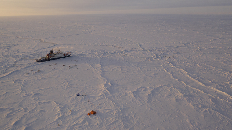 The German Arctic research vessel Polarstern in the ice next to a research camp in the Arctic region. Dozens of scientists are waiting in quarantine for the all-clear to join a year-long Arctic research mission aimed at improving the models used for forecasting climate change, just as the expedition reaches a crucial phase, Friday, April 24, 2020. Photo: Manuel Ernst/Alfred-Wegner-Institut via AP