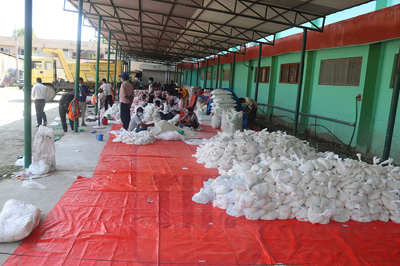 Relief materials being prepared for distribution to those who where missed, in Dhangadhi Sub-Metropolitan City, on Monday, May 11, 2020. Photo: Tekendra Deuba/THT