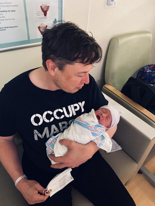 Elon Musk with his baby. Photo Courtesy:  Elon Musk./Twitter