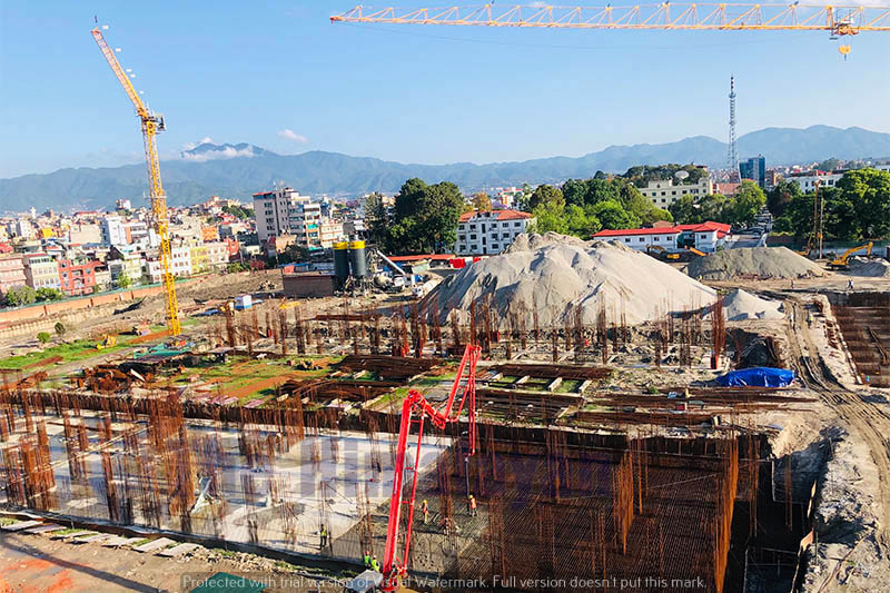 A machine is being used for laying the foundation of the under-construction federal parliament building, at Singha Durbar, Kathmandu, on Monday, May 04, 2020. Photo: Mausam Shah Nepali/THT