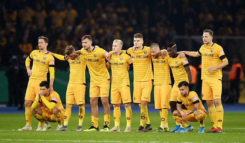 FILE - Dynamo Dresden players during the penalty shootout during DFB Cup Second Round match between Hertha BSC and Dynamo Dresden, at Olympiastadion, in Berlin, Germany, on October 30, 2019. Photo: Reuters