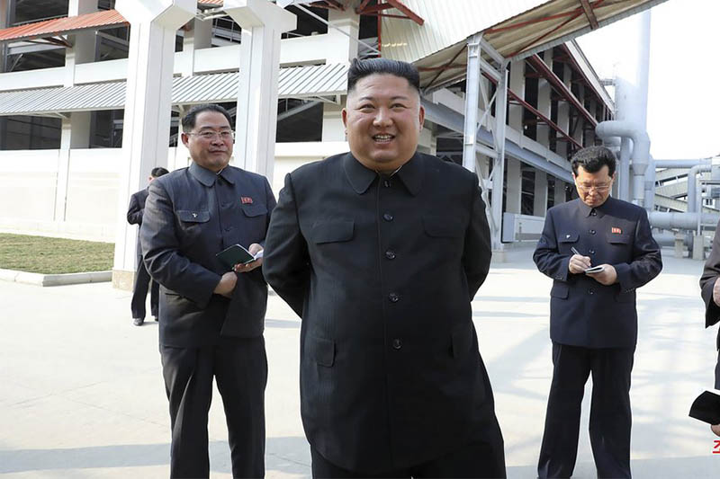 ADDING CITY - In this Friday, May 1, 2020, photo provided by the North Korean government, North Korean leader Kim Jong Un, center, visits a fertilizer factory in Sunchon, South Pyongan province, near Pyongyang, North Korea. Photo: AP