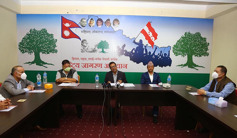 A special committee formed by the Nepali Congress under the coordination of party leader Binod Chaudhary to study the impact of COVID-19 and suggest a way forward submits its report to the party President Sher Bahadur Deuba on Sunday, May 24, 2020. Photo: RSS