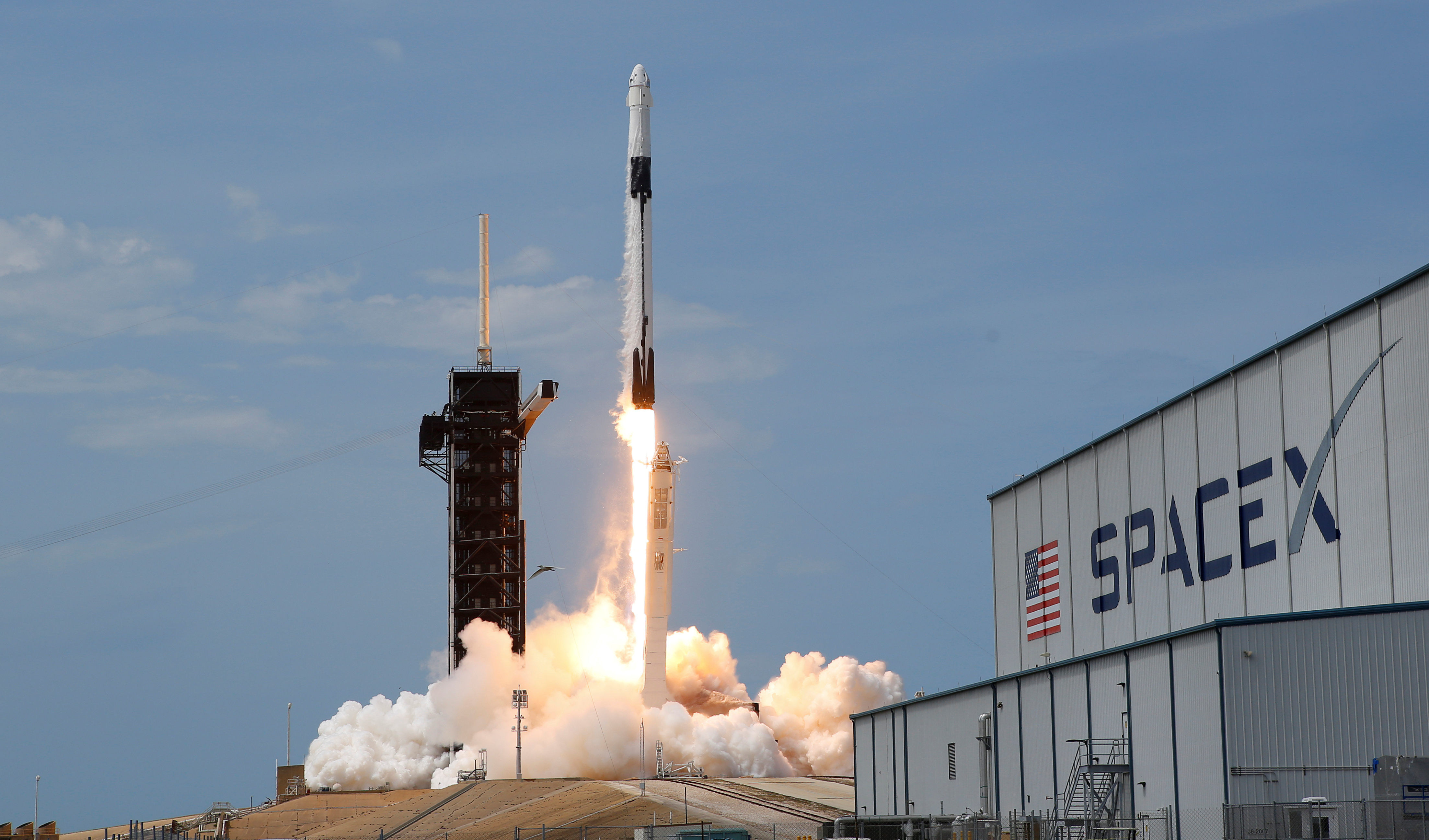 A SpaceX Falcon 9 rocket and Crew Dragon spacecraft carrying NASA astronauts Douglas Hurley and Robert Behnken lifts off during NASA's SpaceX Demo-2 mission to the International Space Station from NASA's Kennedy Space Center in Cape Canaveral, Florida, US, on May 30, 2020. Photo: Reuters