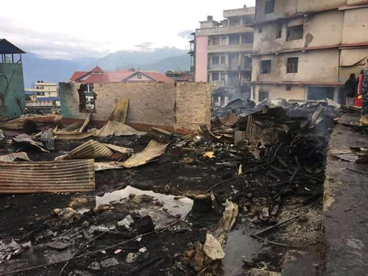 The remains of houses gutted by fire which occurred in Phungling Bazaar, Taplejung district, as seen on Saturday, May 2, 2020. Photo: Laxmi Gautam/THT