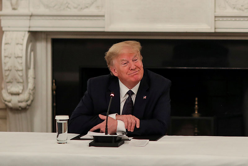US President Donald Trump speaks with restaurant executives and industry leaders during a coronavirus disease (COVID-19) pandemic meeting in the State Dining Room at the White House in Washington, US, on May 18, 2020. Photo: Reuters