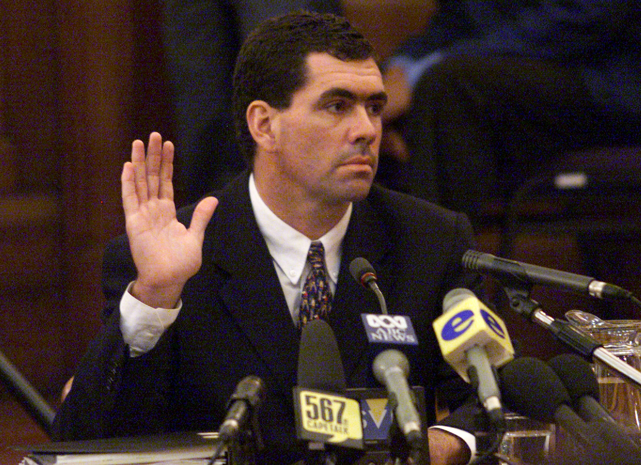 FILE PHOTO: Disgraced former South African cricket captain Hansie Cronje is sworn in to testify at the King Commission of Inquiry into allegations of match fixing in South African cricket, June 15, 2000. Photo: Reuters