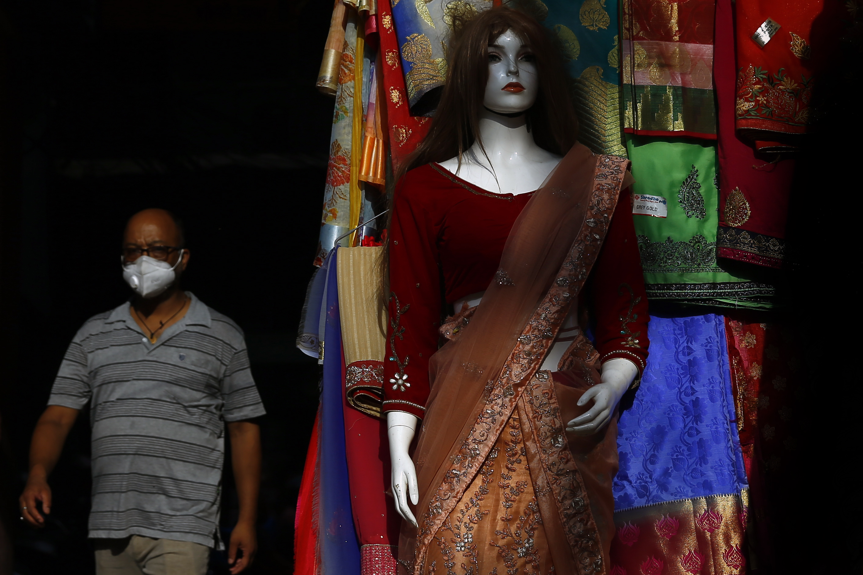 Shoppers are out and about in Ason bazaar after the government eased movement restrictions in Kathmandu. Photo: Skanda Gautam/THT