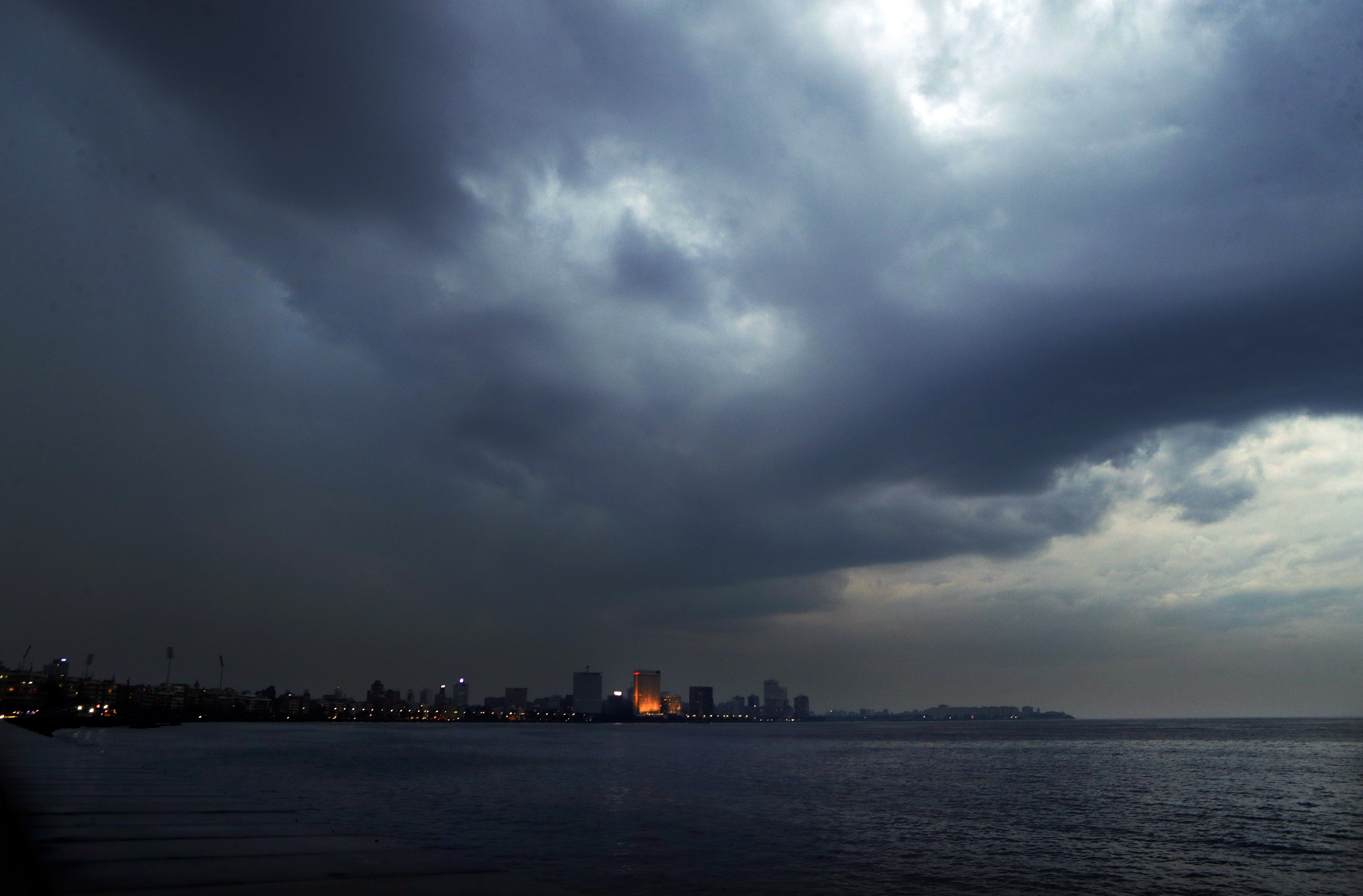 Dark clouds hang over the city ahead of cyclone Nisarga making landfall in Mumbai, India, Tuesday, June 2, 2020. The cyclone made landfall Wednesday south of India's financial capital of Mumbai, with storm surge threatening to flood beaches and low-lying slums as city authorities struggle to contain the coronavirus pandemic. Photo: AP