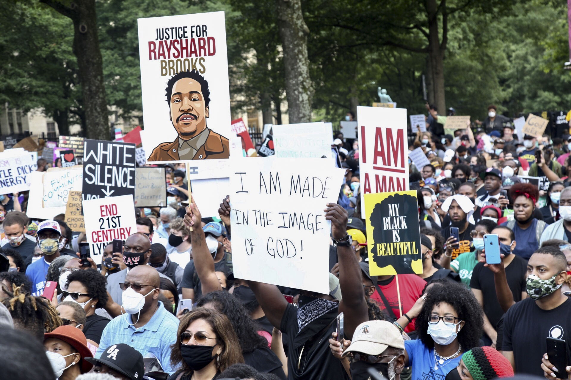 A crowd of demonstrators march to the Capitol Monday, June 15, 2020 in Atlanta. The NAACP March to the Capitol coincided with the restart of the Georgia 2020 General Assembly. Lawmakers returned wearing masks and followed new rules to restart the session during the pandemic. Photo: AP