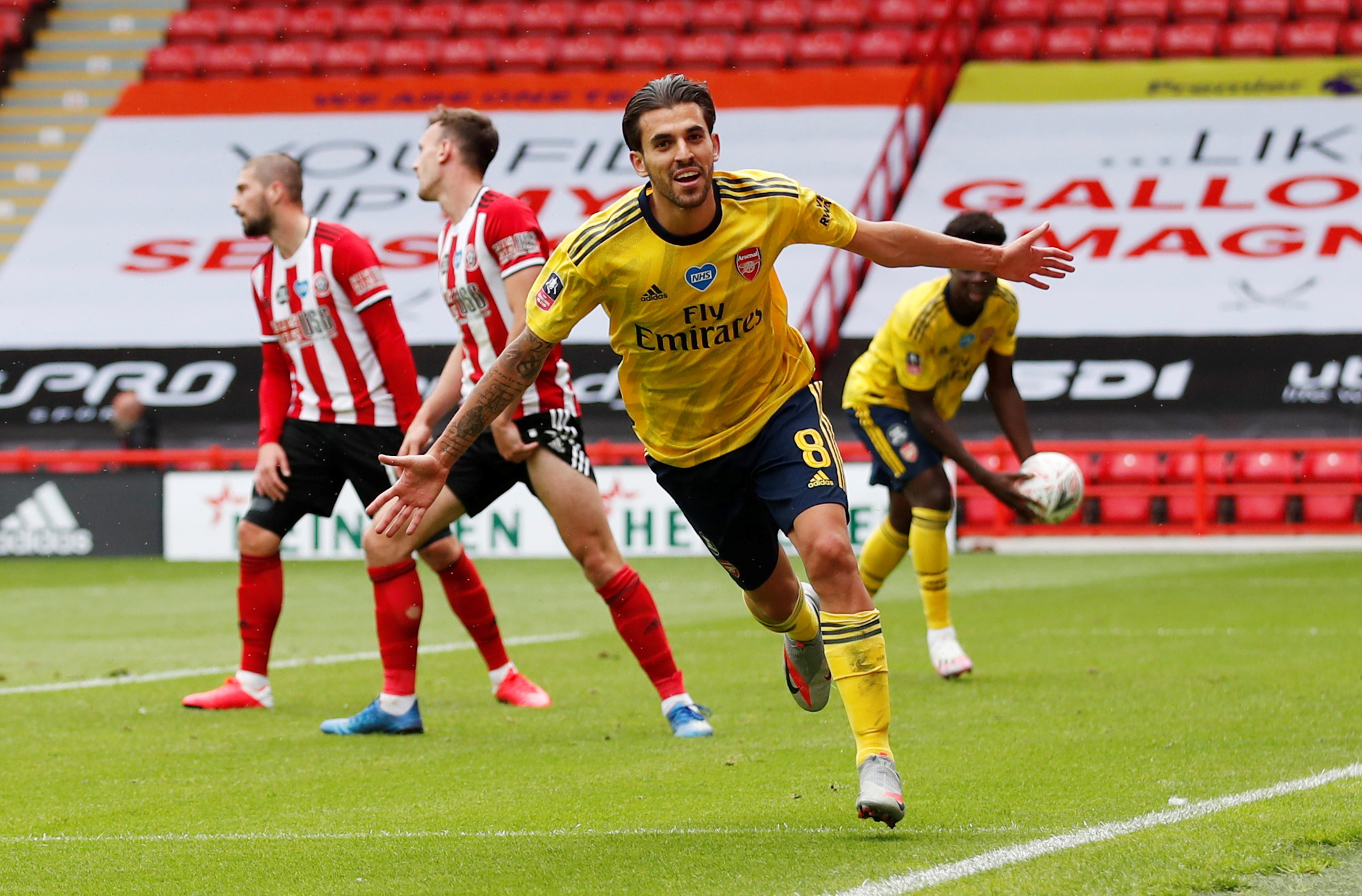Arsenal's Dani Ceballos celebrates scoring their second goal, as play resumes behind closed doors following the outbreak of the coronavirus disease (COVID-19). Photo: Reuters 